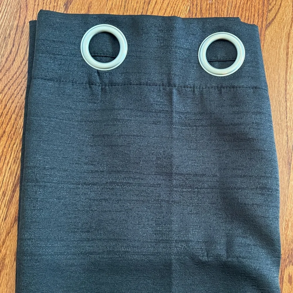 Black grommet top curtains two panels. 37”W by 96” L